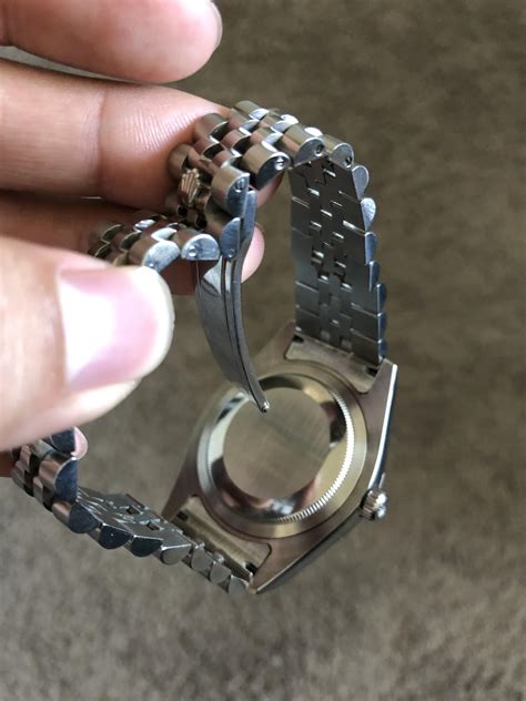 how to open Rolex watch band